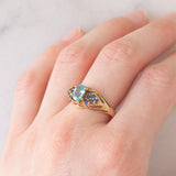 Anello vintage in oro giallo 9K con apatite (0.80ctw ca.) e zaffiri (0.37ctw ca.), anni ‘80/‘90