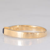Solitario a fascia vintage in oro giallo 14K con zaffiro di taglio carré (0.18ct ca.), anni ‘70