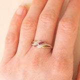 Vintage 9K yellow and white gold ring with rubies (0.20ctw approx.) and diamonds (0.03ctw approx.), 70s/80s