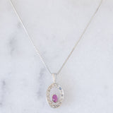 Collana vintage in platino con ciondolo con rubino (0.21ct) e diamanti di taglio brillante (0.24ctw)