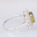 Anello a fiore vintage in platino con topazio verde (2.76ct) e diamanti (1.11ctw), anni ‘2000