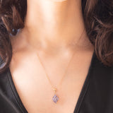 Vintage necklace with 9K yellow gold chain and 9K yellow gold pendant with tanzanites (approx. 1.35ctw), 70s/80s
