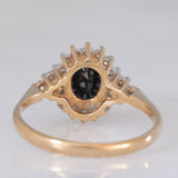 Bague marguerite vintage en or jaune et blanc 9 carats avec saphir (environ 1 ct) et diamants (environ 0.22 ct au total), 1989