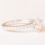 Solitaire in 18K white gold with brilliant cut diamonds (central approx. 1.23ct)