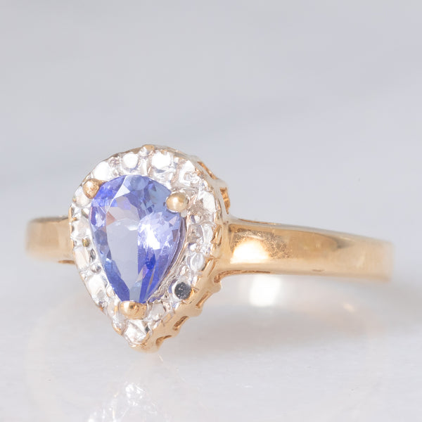 Anello a margherita vintage in oro giallo e bianco 9K con tanzanite (0.60ct ca.), anni ‘90
