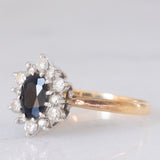 Anello a margherita vintage in oro giallo 9K con zaffiro (1ct ca.) e diamanti di taglio brillante (0.33ctw ca.), anno 1987