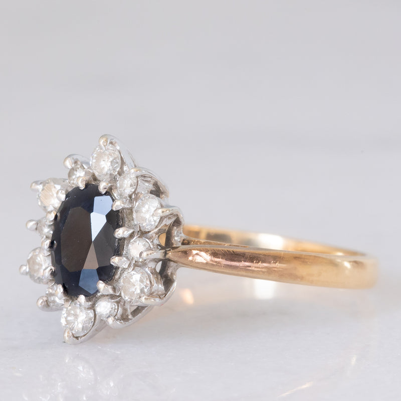 Anello a margherita vintage in oro giallo 9K con zaffiro (1ct ca.) e diamanti di taglio brillante (0.33ctw ca.), anno 1987