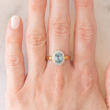 Anello a margherita in oro giallo 9K con zircone azzurro (1.83ct ca.) e zirconi bianchi