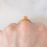 Solitario vintage in oro giallo 9K con spessartite (0.27ct ca.)