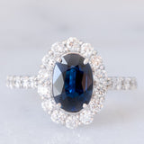 Anello a margherita vintage in platino con zaffiro (1.40ct) e diamanti di taglio brillante (0.94ctw), anni ‘80/‘90