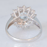 Anello a margherita moderno in oro bianco 9K con acquamarina (0.60ct ca.), diamanti (0.12ctw ca.) e morganiti (0.84ctw ca.), anni ‘2000
