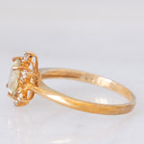 Anello “sole” in oro giallo 9K con apatite verde (1.19ct) e zaffiri bianchi