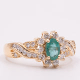 Anel vintage margarida em ouro amarelo 14K com esmeralda (aprox. 0.40 ct) e diamantes lapidação brilhante (aprox. 0.60 ctw), anos 70/80