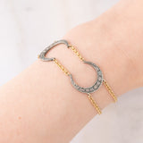 Vintage 18K yellow gold and silver semi-rigid bracelet with crescent-shaped decorations and rose-cut diamonds, 50s