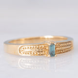 Solitario in oro giallo 9K con diamante blu trattato (0.07ct)