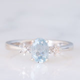 Trilogy vintage in oro bianco 18K con acquamarina (0.60ct ca.) e diamanti, anni ‘80