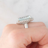 Anello a margherita vintage in platino con acquamarina (17.93ct) e diamanti (1ctw), anni ‘70/‘80