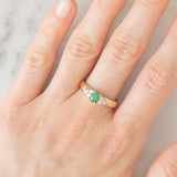 Vintage 9K yellow gold band ring with emerald (0.25ct approx.) and diamonds (0.12ctw approx.)