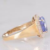 Anello a margherita vintage in oro giallo e bianco 14K con tanzanite (2.10ct ca.) e diamanti (0.30ctw ca.), anni ‘80