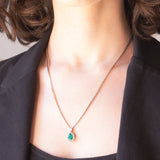 Halskette aus 18-karätigem Weißgold mit Smaragd (ca. 1.20 ct) und Diamanten im Brillantschliff (ca. 0.58 ctw)