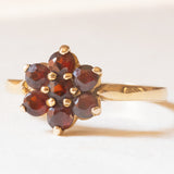 Vintage Gänseblümchenring aus 9-karätigem Gelbgold mit Granaten, 1976