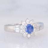 Anello a margherita vintage in platino con zaffiro (0.51ct) e diamanti (0.43ctw), anni ‘90