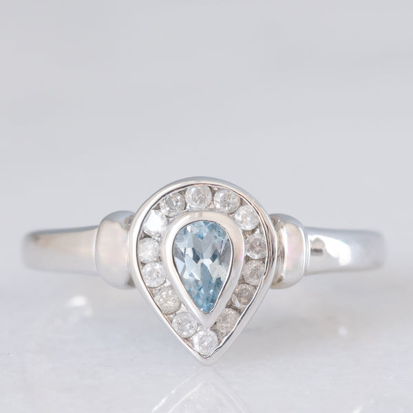 Anello vintage in oro bianco 9K con acquamarina (0.20ct ca.) e diamanti di taglio brillante (0.14ctw ca.), anni ‘90