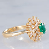 Anello ballerina vintage in oro giallo 14K con smeraldo (0.50ct ca.) e diamanti di taglio brillante e tapered (0.96ctw ca.), anni ‘80