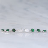 Vintage platinum drop earrings with pear-cut diamonds (0.58ctw) and heart-cut tsavorites (1.36ctw), 90s