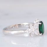 Anello vintage in platino con tsavorite (0.94ct) e due fiori di diamanti (0.78ctw), anni ‘90/anni ‘2000