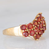 Anello in oro giallo 9K con pietre rosse