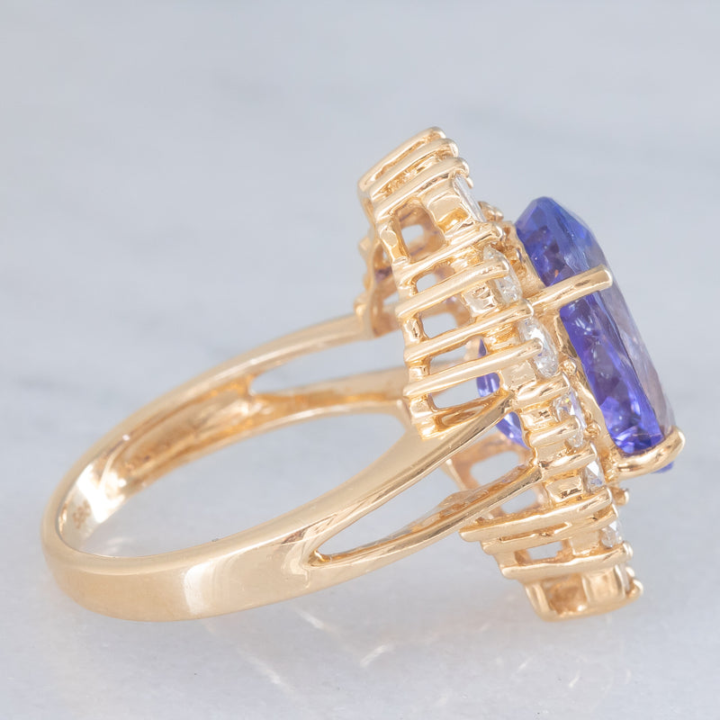 Anello ballerina vintage in oro giallo 14K con tanzanite (5.60ct ca.) e diamanti di taglio brillante e tapered (1.30ctw ca.), anni ‘70/‘80