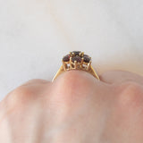 Anello a fiore vintage in oro giallo 8K con granati (1.10ctw ca.), anni ‘70