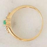 Vintage 9K yellow gold band ring with emerald (0.25ct approx.) and diamonds (0.12ctw approx.)