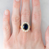 Anello a margherita vintage in oro giallo 18K con zaffiro (4.40ct ca.) e diamanti di taglio brillante (1.68ctw ca.), anni ‘70/‘80