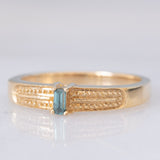 Solitario in oro giallo 9K con diamante blu trattato (0.07ct)