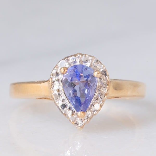 Anello a margherita vintage in oro giallo e bianco 9K con tanzanite (0.60ct ca.), anni ‘90