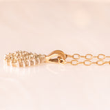 Collana vintage con ciondolo in oro giallo 9K e ciondolo in oro giallo e bianco 9K con diamanti (0.15ctw ca.)