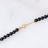 Collana moderna con onice e oro giallo 18K