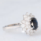 Anello ballerina vintage in oro bianco 14K con zaffiro (0.85ct ca.) e diamanti di taglio brillante (0.50ctw ca.), anni ‘80