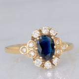 Anello a margherita vintage in oro giallo 14K con zaffiro (0.70ct ca.) e diamanti (0.20ctw ca.), anni ‘80