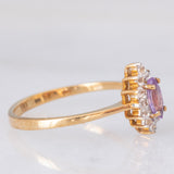 Anello a margherita in oro giallo 9K con zaffiro viola sintetico (0.25ct) e zirconi bianchi