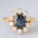 Anello a margherita vintage in oro giallo 14K con zaffiro (1.30ct ca.) e diamanti di taglio brillante (0.47ctw ca.), anni ‘60/‘70