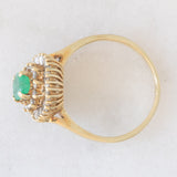 Anello ballerina vintage in oro giallo 14K con smeraldo (0.50ct ca.) e diamanti di taglio brillante e di taglio tapered (0.50ctw ca.), anni ‘70