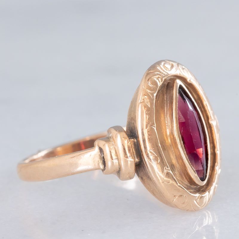 Anello vintage in oro giallo 14K con granato di taglio marquise (0.50ct ca.), anni ‘60