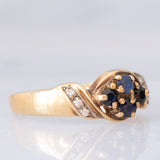 Anello a fiore vintage in oro giallo 9K con zaffiri e diamanti, anni ‘90