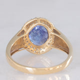 Anello a margherita vintage in oro giallo e bianco 14K con tanzanite (2.10ct ca.) e diamanti (0.30ctw ca.), anni ‘80