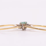 Raro anello girevole 2 in 1 in oro giallo e bianco 18K con smeraldo (0.30ct ca.) e diamanti di taglio brillante (0.20ctw ca.), anni ‘70/‘80