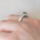 Vintage platinum daisy ring with color-change garnet (approx. 0.35ct) and diamonds (0.58ctw)