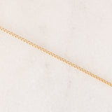 Collana vintage con catenina in oro giallo 9K e con ciondolo a margherita in oro giallo 9K con acquamarina (0.30ct ca.) e diamanti (0.06ctw ca.)
